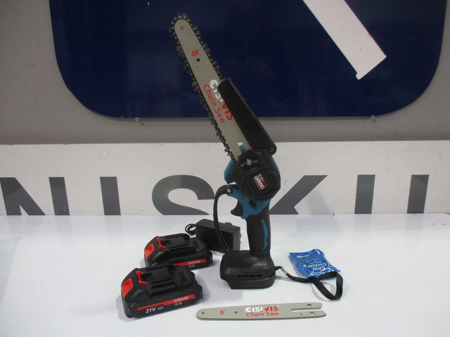 1073 - MINI CHAIN SAW 6 + 8 INCH BLADES AND 2 BATTERIES (NEW)